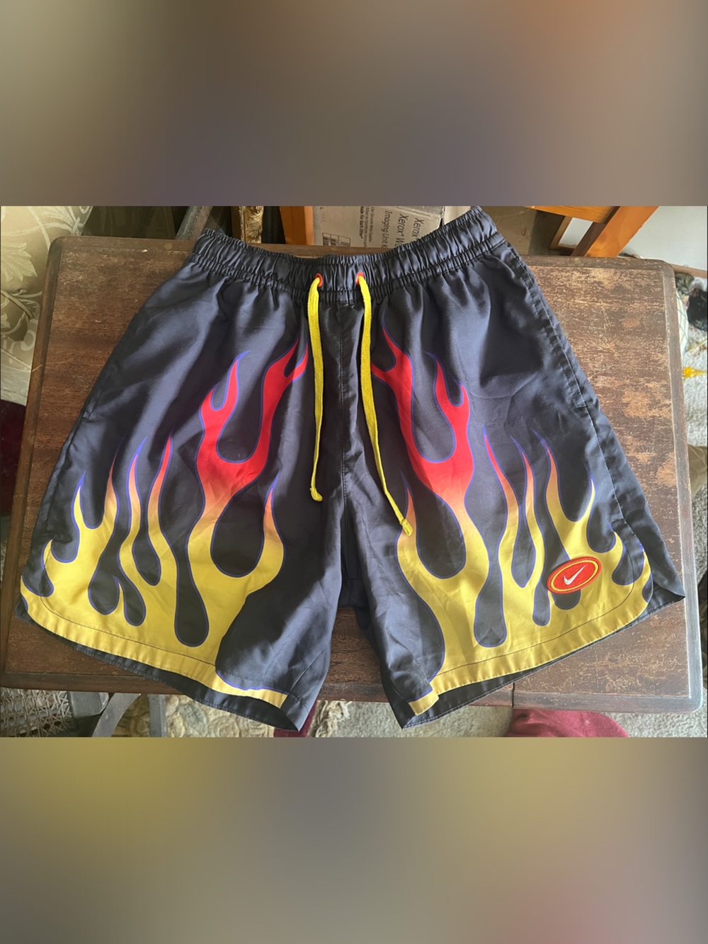 Nike Dark Blue Athletic Shorts with Yellow and Red Flame Graphic